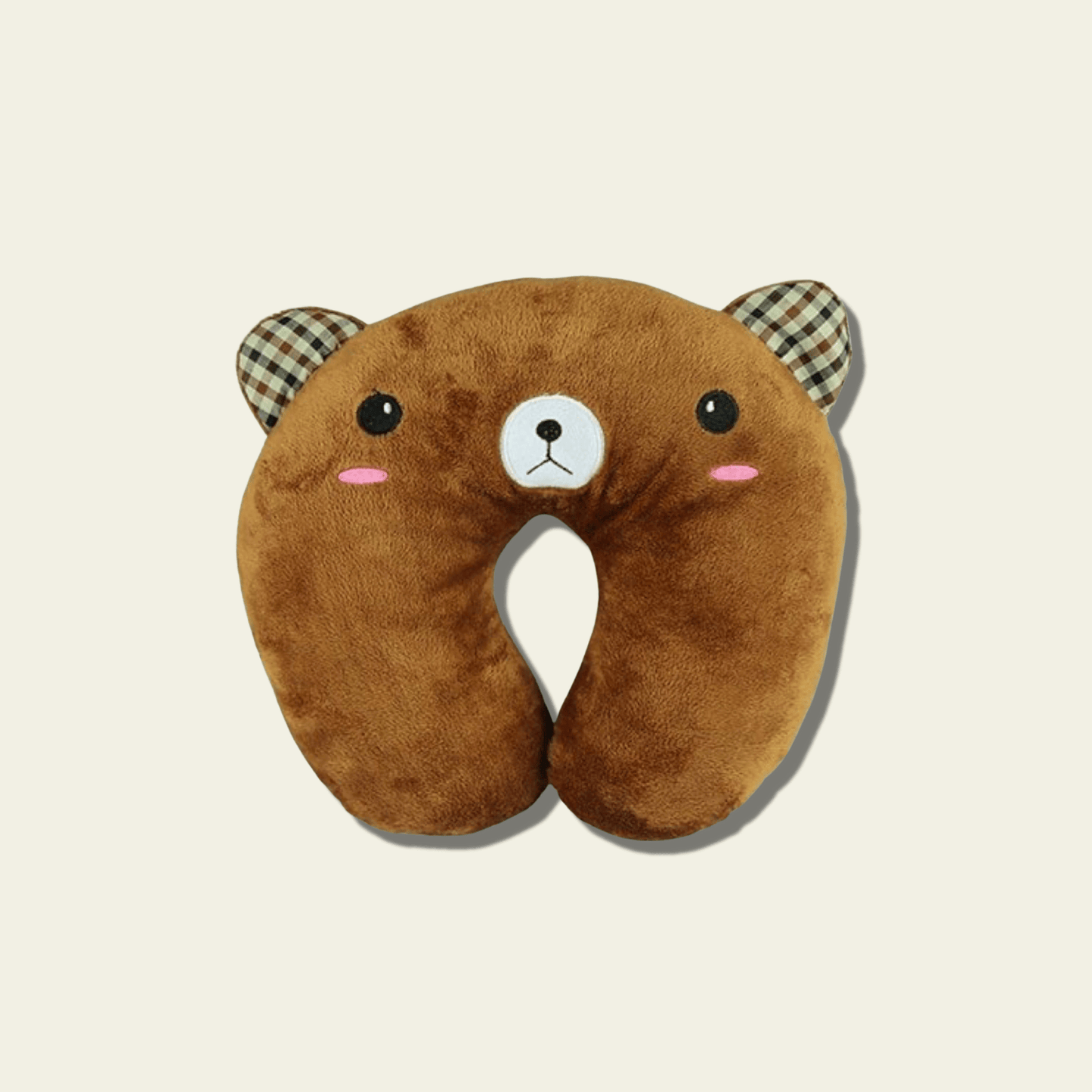 This adorable neck pillow for kids is designed to provide comfort and support during travel. Shaped like a cute brown bear, it offers a fun and cozy experience for children while they rest on long car rides, flights, or during naps. The soft and plush material ensures comfort, while the pillow’s ergonomic design helps support the neck for a more relaxed journey.