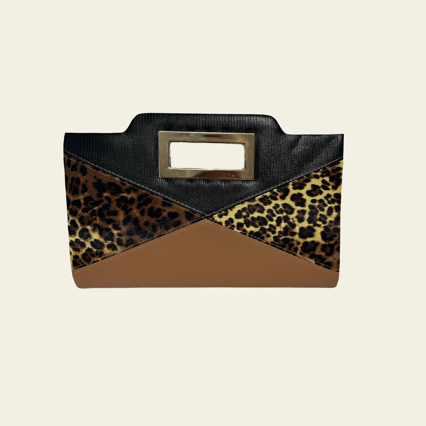 This brown-colored clutch features an animal print pattern combined with a geometric triangle design, offering a modern yet bold aesthetic. The compact size is perfect for carrying essentials like your phone, cards, and makeup, while the unique pattern adds a stylish, eye-catching element. Its sleek, structured shape makes it a versatile accessory for evening events or formal occasions.