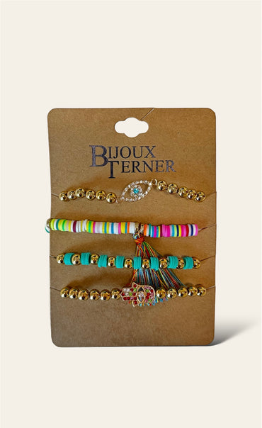 The Boho Stack Bracelets set features four colorful and playful bracelets, displayed neatly on a card. Each bracelet is designed with unique patterns and vibrant hues, ranging from bold blues and pinks to earthy tones, creating a lively, bohemian-inspired look. The mix of beads, threads, and charms gives each bracelet its own distinctive charm, making them perfect for layering together or wearing individually