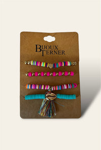 The Boho Stack Bracelets set features four colorful and playful bracelets, displayed neatly on a card. Each bracelet is designed with unique patterns and vibrant hues, ranging from bold blues and pinks to earthy tones, creating a lively, bohemian-inspired look. The mix of beads, threads, and charms gives each bracelet its own distinctive charm, making them perfect for layering together or wearing individually.