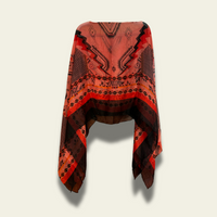 This lightweight chiffon poncho drapes beautifully, showcasing a vibrant blend of red and black with an abstract print. 